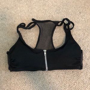 Zip up black bikini top (never worn) size small